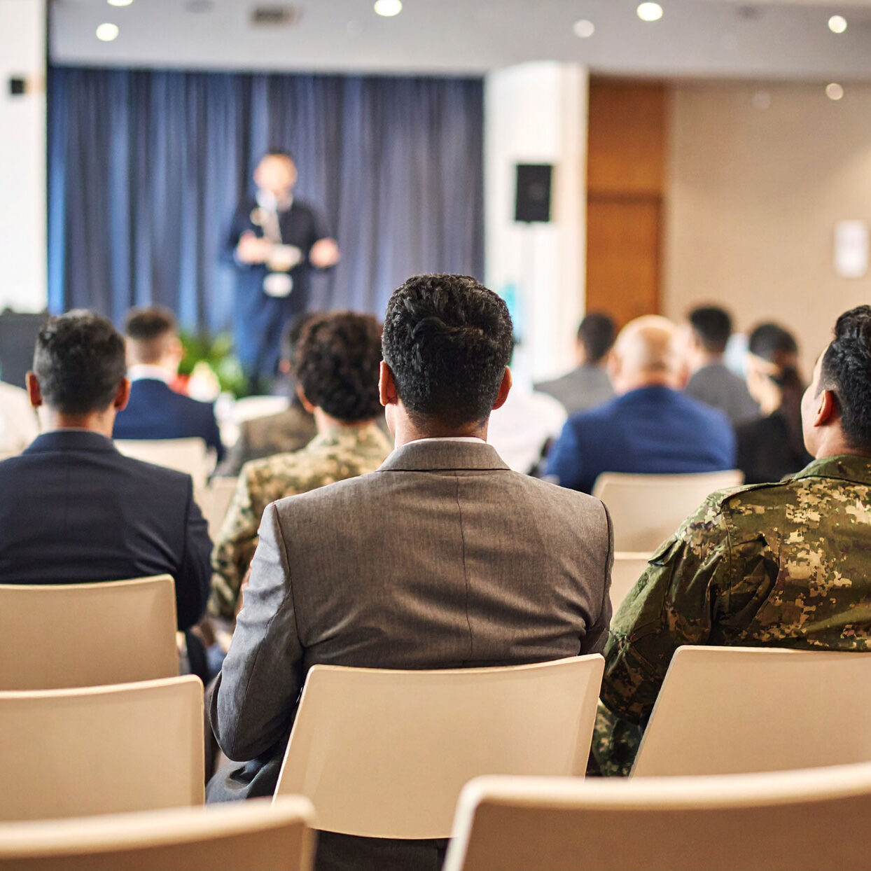 people-seating-a-conference-at-a-hotel-conference-room,-business-dressed-up